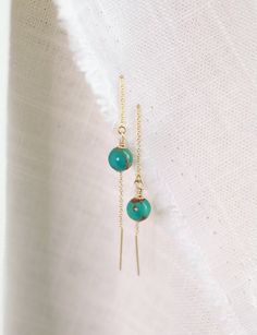 Details:  - Handmade Item - Genuine and natural Turquoise - 3in 14k Gold filled or Sterling Silver* chain - Lead and Nickel Free. Safe for sensitive skin. * sterling silver can show signs of tarnish, use microfiber cloth to clean ** the bar is delicate, gently insert through earring hole Each earring set arrives on a jewelry card. We strive to make a positive impact on our earth which is why our earrings are packaged and sent to you using recyclable paper envelopes and jewelry cards. Please recycle accordingly!  Please note:  Because we use natural and genuine crystals and stones, there may be slight variations in size and color unique to each order.  All information about the metaphysical properties of the crystals is for reference only. Using or wearing crystals or stones does not mean t Everyday Turquoise 14k Gold Jewelry, Everyday 14k Gold Turquoise Jewelry, Dainty Turquoise Hypoallergenic Jewelry, Dainty Hypoallergenic Turquoise Jewelry, Everyday Turquoise Gemstone Earrings, Elegant Turquoise Jade Jewelry, Turquoise 14k Gold Filled Earrings For Everyday, Everyday Turquoise Wire Wrapped Jewelry, Everyday Turquoise 14k Gold Filled Earrings