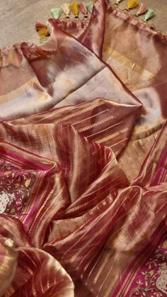 Pure Organza Tissue Silk Banarasi Stripe Pichwai Embroidery on Katan Silk Satin Border Saree Luxury Festive Katan Silk Sets, Luxury Banarasi Silk Traditional Wear With Printed Border, Luxury Silk Fabric With Zari Work, Luxury Banarasi Silk Embroidered Fabric In Traditional Style, Luxury Banarasi Silk Shawl For Traditional Ceremonies, Luxury Festive Raw Silk Fabric, Luxury Raw Silk Fabric For Traditional Ceremonies, Chanderi Meenakari Pre-draped Saree For Navratri, Gold Embroidered Silk Pre-draped Saree