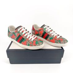 Gucci Ace Web Stripe Sneaker In Beige Gg Strawberry Print Pre-Owned & Authentic Size 38 (Equivalent To Us Women's Size 8 Per Gucci Website) Original Box, Two Dust Bags And Spare Laces Included Low Top Lace Up Sneaker Beige Gg Monogram Coated Canvas Upper With Red And Pink Strawberry Print Green And Red Web Stripe Accent On Side Of Foot Round Toe Leather Footbed And Lining Flat Heel Rubber Outsole Shoes Show Signs Of Gentle Use, Including Creasing And Discoloration/Scuffing On Midsoles And Outsol Gucci Strawberry Shoes, Red Web, Striped Sneakers, Pink Strawberry, Gg Monogram, Strawberry Print, Shoe Show, Green And Red, Gucci Shoes