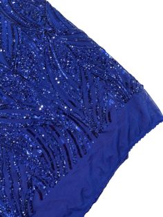 a blue dress with sequins on it