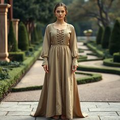 This beige medieval gown for women is a beautiful representation of historical attire that will bring to life the grace of both the Renaissance and Gothic periods. This flowing, fully lace-up-front dress is ideal for Renaissance Faires, medieval reenactments, or even as a very unique cosplay costume. The subtle beauty added by the soft beige color makes this outfit versatile enough to be worn anywhere. This gown is made of excellent materials for comfort and durability so that it will not wear o Vintage Medieval Dress For Cosplay, Regency Style Long Sleeve Medieval Costume Dress, Victorian Dress With Historical Design For Costume Party, Regency Dresses For Medieval Festivals, Medieval Style Victorian Dress For Costume Parties, Medieval Style Victorian Dress For Costume Parties And Festivals, Medieval Victorian Dress For Costume Party, Medieval Victorian Dress For Costume Party And Festivals, Vintage Medieval Dress For Cosplay With Historical Design