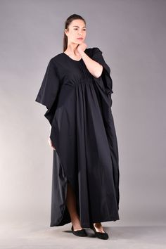 "Very romantic caftan dress in black. The main advantages of this long black dress are the kimono sleeves and the loose fit cut which hides any flaws while the gathered detail under the bust emphasizes the top part of the body. This black maxi dress is very comfortable so it is a great choice for the daytime matched with flats. ^ Sizes: The item can be made in sizes from XXS to 7XL. Please, use the size chart below or if you are not sure about your size, just * contact us with your measures! ^ E Black Oversized Long Abaya, Oversized Black Long Abaya, Chic Black V-neck Kaftan, Long Black Abaya For Spring, Black Long Abaya For Spring, Elegant Black Batwing Sleeve Dress, Long Black Spring Abaya, Spring Black Long Abaya, Spring Black Oversized Maxi Dress