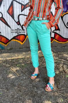 Our Turquoise Creek Pants are the perfect addition to any outfit! These turquoise bottoms feature functional buttons, a stretchy waist-band and deep pockets for added convenience. Plus, the true-to-size stretchy fit ensures you'll feel comfortable and confident all day long. Make a statement with these pants! 98% Cotton, 2% Spandex Green Relaxed Fit Bottoms With Button Closure, Green Bottoms With Button Closure, Turquoise Bottoms With Pockets For Summer, Turquoise Summer Bottoms With Pockets, Stretch Turquoise Bottoms For Spring, Casual Turquoise Pants, Casual Turquoise Summer Pants, Casual Bodysuit, Jumpsuit Shorts Rompers