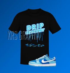 This t-shirt inspired by the KRS Graphix Dunk 'Argon' colorway is everything you've dreamed of and more. It feels soft and lightweight, with the right amount of stretch. It's comfortable and flattering for both men and women. This Jordan inspired design is perfect for sneakerheads everywhere!  * 100% combed and ring-spun cotton (Heather colors contain polyester) * Ash color is 99% combed and ring-spun cotton, 1% polyester * Heather colors are 52% combed and ring-spun cotton, 48% polyester * Athl Blue Graphic Design Shirt For Streetwear, Argon Dunks, Sb Dunks, Shoe Display, Ash Color, We Wear, Sneaker Head, Perfect Match, Spun Cotton