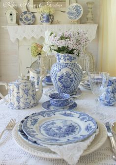 blue and white porcelain items displayed on counter top