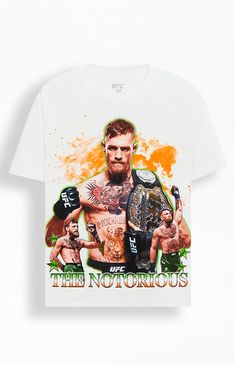 Show your support for the MMA legend with the Conor McGregor "The Notorious" UFC Oversized T-Shirt. This stylish tee features bold graphics and the iconic "The Notorious" moniker, celebrating McGregor's fierce persona and illustrious career. Perfect for fight night or casual wear, this T-shirt is a must-have for any UFC fan looking to showcase their admiration for Conor McGregor.Crew neckline


	Crew neckline
	Short sleeves
	Oversized fit
	100% Cotton
	Front & back graphi Band Merch T-shirt With Graphic Print For Sports, Crew Neck T-shirt With Front Print For Fan Events, Graphic Tee For Fan Events With Logo Print, Graphic Tee With Logo Print For Fan Events, Fan Apparel Graphic Print T-shirt For Events, Sports Events Fan Apparel T-shirt With Front Print, Graphic Tee For Fan Events, White T-shirt With Front Print For Sports Events, Crew Neck Graphic T-shirt For Sports Events