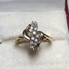 Absolutely Stunning Vintage 14k Yellow Gold Natural Diamond Ring Diamonds: 0.20CT Color: G Clarity: SI2 Total ring weight: 2.9GR 14K Yellow Gold Ring sizing available Free of Charge For more information regarding this item feel free to reach me so I can accommodate your needs. Thank you 14k Gold Cluster Diamond Ring, 14k Gold Cluster Diamond Ring With Prong Setting, Yellow Gold Cluster Diamond Ring For Anniversary, Yellow Gold Diamond Cluster Ring For Anniversary, Gold Cluster Ring With Vs Clarity, Anniversary Yellow Gold Cluster Diamond Ring, 14k Gold Bypass Ring With Vvs Clarity For Promise, Cluster Yellow Gold Diamond Ring With Prong Setting, Classic 14k Gold Cluster Diamond Ring