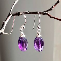 "6596 Amethyst Earrings Sterling Silver purple natural gemstone simple classy casual oval dangle drops February birthstone birthday anniversary Valentine's day Mother's day Christmas holiday gift for her women mom sister wife girlfriend daughter niece aunt grandma cousin colleague best friend. Enjoy the beauty & power of natural gemstone. MATERIALS & DIMENSIONS ✦ Natural AMETHYST, deep purple, faceted ovals approx. 12x8mm; ✦ STERLING SILVER spacers, pins and fish hook (shown) or lever back ear w Oval Hypoallergenic Teardrop Earrings As Gift, Hypoallergenic Oval Teardrop Earrings For Gifts, Amethyst Teardrop Crystal Earrings, Oval Gemstone Teardrop Earrings As Gift, Nickel-free Oval Teardrop Earrings, Oval Faceted Earrings For Gift, Oval Faceted Earrings As Gift, Oval Amethyst Earrings For Gift, Classic Oval Teardrop Earrings As Gift