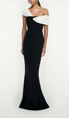 Make a Showstopping Entrance in This Dramatic Black Maxi Dress With an Asymmetric Off-The-Shoulder Ruffle Neckline. The Breezy Chiffon Skirt Sways Hypnotically as You Dance, While the Slim Bodice Hugs Your Shape. Accentuate the Waist With a Belt. Step Into the Spotlight and Let This Bold Maxi Dress Do the Talking Wherever You Go. Fitted bodice and fluted hem Fabric twist at bodice Internal corset Zip fastening at side Fully lined bodice Skirt unlined Main Fabric: 97% Viscose, 3% Elastane Contras Full Skirt Bridesmaid Dress, Off Shoulder Neckline Dress, Maxi Dress One Shoulder, A Line Skirt Dress, Black Tie Formal Dress Elegant, Asymmetrical Off Shoulder Dress, Old Money Dresses Gala, Black Gown Wedding, One Shoulder Dress Outfit