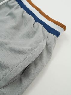 Inspired by the nostalgic era of the 90s, we designed this short to fit right above your knee.The Grey Scale Active Short is made with 4 technical multi-stretch fabrics. Deep pockets on the side. Ribbed waistband with an adjustable drawstring. Inner lining that wicks away moisture and provides ultimate comfort. Above the knee fit Made with 4 multi-stretch fabric (contains spandex) Ribbed Waistband Embroidered Kinetic branding Model 5'10 160lbs wearing size Medium Grey Scale, Mesh Short, Mesh Shorts, Active Shorts, The 90s, Wicks, Above The Knee, The Knee, Philosophy