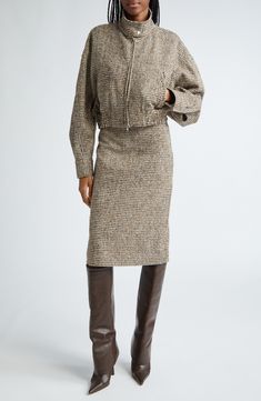 Keep your look perfectly polished with this woolly pencil skirt in a classic houndstooth pattern. 25 1/2" center front length (size 8) Back vent Lined 67% polyester, 20% wool, 11% acrylic, 2% other fibers Dry clean Imported Winter Tweed Skirt For Workwear, Fall Tweed Pencil Skirt, Fall Workwear Pencil Skirt, Fall Houndstooth Tweed Dress For Work, Brown Pencil Skirt For Workwear In Fall, Fall Pencil Skirt For Business Casual, Business Casual Pencil Skirt For Fall, Fall Wool Skirt For Workwear, Wool Skirt For Work In Fall