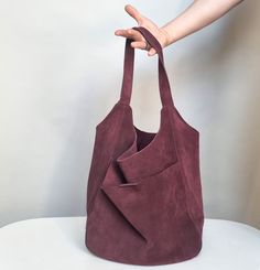 ♥  Beautiful aubergine hobo leather bag. Made of natural suede leather.  Soft, fleshy leather. Large. Can use as leather laptop bag. Outside front pocket with a magnet. At back  an outer zipped pocket. Bag with zipper. Black lining inside. Inside there is a zip pocket and 2 phone pockets. Height of the bag without ears 36 cm. Handles:  42 cm long, very comfortable. The side width is 17 cm. The bag is great, it is very pleasant to touch, it fits a lot and fits everything. Last photo similar, blac Versatile Suede Tote Hobo Bag, Versatile Suede Hobo Tote Bag, Modern Suede Tote Hobo Bag, Everyday Suede Hobo Bag, Modern Hobo Bag For Daily Use With Suede Lining, Modern Hobo Bag With Suede Lining For Daily Use, Versatile Suede Hobo Bag With Soft Leather, Modern Hobo Bag For Daily Use, Versatile Suede Hobo Bag With Soft Leather Details