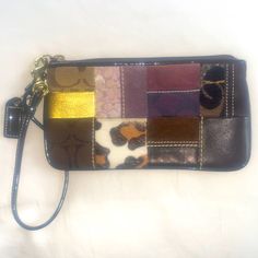 Nwot Coach Holiday Patchwork Suede Brown Leather Wristlet Multicolor Rectangular Wristlet With Strap, Multicolor Rectangular Wristlet With Wrist Strap, Coach Multicolor Wristlet, Multicolor Coach Wristlet For Daily Use, Coach Multicolor Wristlet For Everyday, Coach Rectangular Leather Wristlet, Coach Leather Rectangular Wristlet, Multicolor Everyday Wristlet With Removable Pouch, Everyday Multicolor Wristlet With Removable Pouch