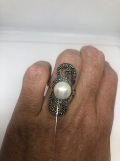 Vintage hand made Genuine Pearl set in 925 Sterling Silver with Marcasite ring Size 7 Can be re sized for you. My jeweler charges about $10-$15 All rings are shipped in a nice gift box. Check out our over a THOUSAND great reviews Engraving is $4 per letter and is not always perfect depending on the piece. It can take a few days if the jeweler is busy. This is payable to Paypal Judithsltd@gmail.com Vintage Jewelry Sets, Marcasite Ring, Pearl Set, Vintage Jewels, 925 Sterling Silver Earrings, Ring Size 7, 925 Sterling Silver Ring, Sterling Silver Ring, Jewelry Set