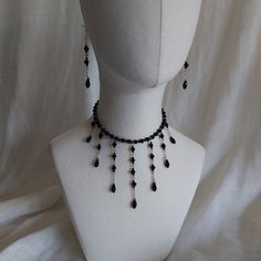 Hand made black glass beaded jewelry set  Up to 18 in adjustable length  Black goes with absolutely everything. Elegant Black Necklace With Adjustable Length, Adjustable Black Gothic Jewelry, Adjustable Black Gothic Necklace, Black Adjustable Gothic Necklace, Elegant Black Dangle Jewelry Sets, Adjustable Dangle Beaded Necklaces For Party, Adjustable Beaded Dangle Necklace For Party, Adjustable Beaded Dangle Necklaces For Party, Black Beaded Dangle Necklace