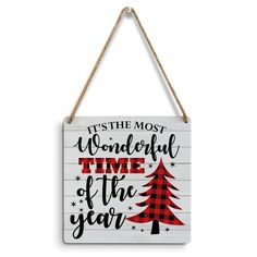 a wooden sign that says it's the most wonderful time of the year with a christmas tree