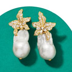 Ross-Simons - Italian 13-18mm Cultured Baroque Pearl, 1.80ct t. w. Cubic Zirconia Flower Earrings Over. Crafted in Italy, these flourishing flower earrings feature 13-18mm cultured freshwater baroque pearls and 1.80 ct. t. w. marquise and round brilliant-cut CZs in polished 18kt yellow gold over sterling silver. Hanging length is 1 3/8". Post/clutch, CZ and white pearl flower earrings. CZ weights are diamond equivalents. Pearls are unique and may vary. Pearl birthstones are the perfect gift for Baroque Pearl And Diamond Earrings, Luxury White Bridal Earrings With Sparkling Stones, Pearl Flower Earrings, Pearl Birthstone, Mother Of Pearl Earrings, Baroque Pearl Earrings, Fine Jewelery, Accessories Jewelry Earrings, Pearl Flower