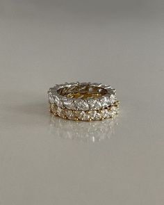 three gold and diamond wedding bands