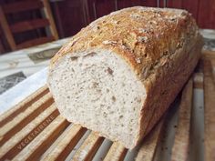 a loaf of bread sitting on top of a cooling rack