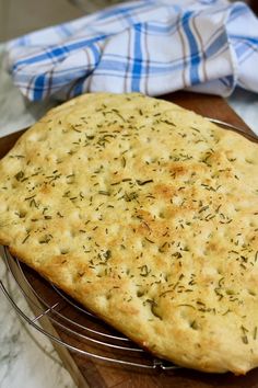 a flat bread is cooling on a wire rack