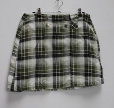 "a vintage green and white plaid mini-skirt ✿ IMPORTANT INFORMATION: * excellent vintage condition * material: 100% cotton * size: large - please check exact measurements below (they're there for your benefit!) * garment care: machine washable ✿ MEASUREMENTS (taken while item is lying flat, some measurements will need to be doubled): * length: 16\" (41cm) * waist: 15\" (38cm) * hips: 19.5\" (50cm) ✿ free UK shipping on orders over £100 with code STRAWBERRY free international shipping on orders o Plaid Lined Mini Skirt For School, Green Mini Length Fall Skort, Plaid Mini Tennis Skirt With Lining, Plaid Mini Tennis Skirt With Lined Skirt, Plaid Skort For School, Plaid Mini Skort For School, Retro Plaid Mini Skirt Bottoms, Retro Plaid Mini Skirt, Plaid Cotton Skort For Fall