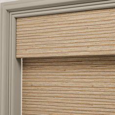 a close up view of a roman blind