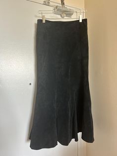 Beautiful mermaid flare black suede skirt from Danier  Suede shows signs of wear but is still in very good condition  Skirt features zipper + hook eye closure and is lined  Labelled size 6 - waist measures 28" Overall in very good vintage condition Mermaid Midi Skirt, Digital Closet, Vintage Suede, Beautiful Mermaids, Suede Skirt, Hook Eye, Vintage Chic, Passion For Fashion, Black Suede