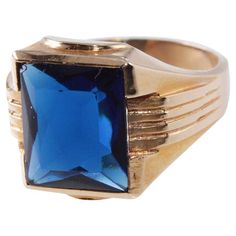 UNISEX RING STYLE / REFERENCE: Art Deco METAL / MATERIAL: 10kt. Solid Gold CIRCA / YEAR: 1940's Stone: Synthetic Sapphire SIZE: 8.5 This great looking ring can be worn by a man or a woman and is easy to size. The ring is entirely hand made and the workmanship is very fine. It is unlikely you will see another ring such as this again. Nearly 25 years ago I purchased a collection of rings from an old jeweler that had been a manufacturer. There were nearly 100 rings in the collection and they were all done in 10Kt. gold. I put them in a box and lost track of them but recently found them and cleaned them up. Some of them were new, old stock. The superior craftsmanship is clearly evident, these rings are the ideal gift for anyone. Collectible Classic 14k Gold Sapphire Ring, Classic 14k Gold Sapphire Collectible Ring, Retro Rings With Polished Finish For Formal Occasions, Retro Formal Rings With Polished Finish, Retro Polished Rings For Formal Events, Retro 14k Gold Formal Rings, Retro 14k Gold Rings For Formal Occasions, Vintage Blue Signet Ring For Formal Occasions, Vintage 14k Stamped Sapphire Ring For Formal Occasions