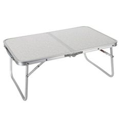 a white folding table with two legs on it's side and one leg up