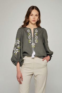 🌷Elevate your wardrobe with our Olive Linen Embroidered Blouse, a perfect blend of comfort and style. This beautifully crafted peasant blouse features delicate embroidery and charming puff sleeves, making it an ideal choice for both casual outings and special occasions.  Made from high-quality linen, this top is breathable and lightweight, ensuring you stay cool and stylish during warmer months. Embrace eco-friendly fashion with our handmade linen clothing, designed for the modern woman who val Green Blouse With Floral Embroidery And Relaxed Fit, Green Embroidered Blouse With Relaxed Fit, Green Embroidered Relaxed Fit Blouse, Folk Style Blouse With Tonal Embroidery For Spring, Spring Floral Embroidery Balloon Sleeve Blouse, Spring Floral Embroidery Blouse With Bishop Sleeves, Folk Style Green Embroidered Top For Spring, Spring Bishop Sleeve Blouse With Floral Embroidery, Spring Floral Embroidered Blouse With Bishop Sleeves