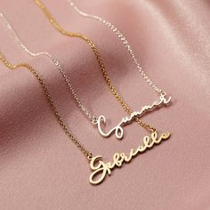 "The Personalised Script Name Necklace is a stylish piece to add to your jewellery collection- it's so good you'll want to wear it everyday! Based upon the classic 'Carrie style' necklace the Personalised Script Name Necklace looks great worn with any outfit. The text has the appearance of handwriting and it makes a gorgeous gift for any occasion be it your best friend's birthday, graduation or special milestone. The Personalised Script Name Necklace is available in Sterling silver, 18ct rose or Customized Signature Necklace For Anniversary, Classic Name Necklace For Birthday, Classic Engraved Necklace For Birthday, Classic Necklace With Custom Name As Gift, Classic Necklace With Custom Name For Gift, Classic Customizable Necklaces For Birthdays, Classic Engraved Necklace For Birthday Gift, Classic Customizable Necklace For Birthday, Customizable Classic Necklace For Birthday