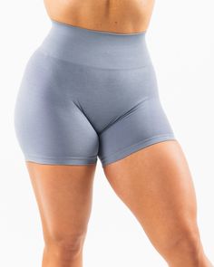 HIGHLIGHTS. High-waisted short. 3-Tiered tapered waistband. Seamless, knit fabric. No front seam. Back scrunch seam detail to enhance curves. Leg and glute contouring panels. Alphalete knit wordmark logo. 4.5” Inseam FIT SUGGESTION. This item runs true to Alphalete’s standard seamless fit.. If you are between sizes, we recommend sizing up.. Model is 5’6”/167.6cm, wearing a size S with a 28”/71.1cm waist and. 42.5”/108cm hips. MATERIALS AND WASHING DIRECTIONS. 51% Polyamide, 38% Polyester, 11% El Wordmark Logo, Word Mark Logo, Hip Hip, Ombre Effect, Womens Bras, Still Water, New Color, Knit Fabric, Summer Fashion