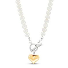 This stunning two-tone necklace for her features a string of classic freshwater cultured pearls along an 18-inch necklace. A sterling silver toggle clasp meets at the center and is embellished with sparkling diamond accents. A pretty double-sided 10K yellow gold and sterling silver heart drops below to finish the design. Necklace For Her, Toggle Necklace, Sparkling Diamond, Accessories Jewelry Necklace, Freshwater Cultured Pearls, Pearl Diamond, Necklace Sterling Silver, Sterling Silver Heart, Toggle Clasp