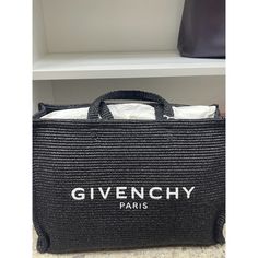 Brand: Givenchy Style: Large Tote Bag Color: Black Material: Woven Raffia Condition: Pre-Owned, Excellent Condition Features: Spacious Interior For All Your Essentials Durable Woven Raffia Construction Iconic Givenchy Paris Logo On The Front Double Top Handles For Easy Carrying Open Top Design For Quick Access Perfect For Daily Use, Beach Days, Or Travel Versatile And Stylish For Any Occasion Details: Upgrade Your Accessory Collection With This Stunning Givenchy Paris Black Woven Raffia Large To Designer Straw Bag For Shopping With Top Carry Handle, Designer Rectangular Straw Bag With Top Carry Handle, Top Handle Straw Bag With Dust Bag For Shopping, Designer Straw Shopping Bag With Top Handle, Designer Top Handle Straw Bag For Errands, Designer Straw Bag With Top Carry Handle, Designer Straw Bag With Top Carry Handle For Travel, Designer Straw Travel Bag With Top Carry Handle, Designer Straw Bag For Travel With Top Carry Handle