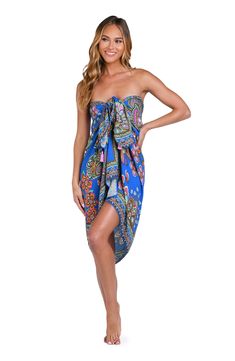 This vibrant print features a floral retro vibe, with a combination of bold and bright colors set against a bright blue background. This sarong-style pareo wrap ties at the side offering a chic silhouette, looking equally beautiful wrapped around your hips over a one-piece suit as it does bikini bottoms. [split] Details Pareo cover-up Adjustable side tie One size fits all Fabric 100% Rayon Crepe Blue Summer Swimwear With Tie Waist, Blue Swimwear With Bold Print For Beach, Blue Tie Waist Swimwear For Summer, Blue Tie Waist Summer Swimwear, Vibrant Blue Printed Swimwear, Bohemian Printed Sarong For Pool, Blue Swimwear With Vibrant Print, Blue Vibrant Print Swimwear, Blue Swimwear With Bold Print For Vacation