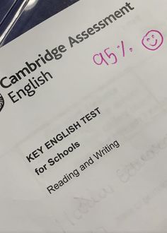 a close up of a piece of paper with writing on it that says cambridge assignment english