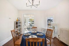 the dining room table is set for four