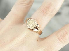 The engraving on this vintage signet ring was so well done, we opted to leave it be, and hope that we found someone with an initial "IB" who loves it as much as we do! Signet rings have a long history. Originally carved with a Family Crest, they were used to seal letters and documents by embossing the crest in wax. Over time they have evolved into day to day jewelry, which can be engraved with any crest, monogram or initial one desires. Metal: 14K Rose and Yellow Gold Top Measurements: 11 x 12 m Vintage Initial Ring For Anniversary, Vintage Stamped Initial Ring For Anniversary, Vintage Oval Stamped Signet Ring, Vintage Stamped Signet Ring For Anniversary, Vintage Signet Ring With Engraving Option, Vintage Signet Ring With Initials, Luxury Classic Monogram Signet Ring, Victorian 14k Gold Signet Ring With Initials, Vintage Monogram Signet Ring Gift