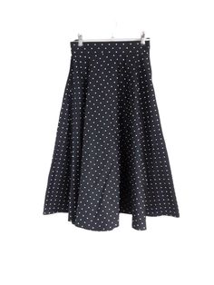 Vintage women's high waisted black and white polka dot cotton pleated a-line midi skirt by Uniqlo. Featuring an elasticated waistband at the back of the skirt, an a-line shaped silhouette and a mid length hem.  * Size:  Labelled a UK 6 (EUR 34/XXS)  * Brand:  Uniqlo  * Material:  Might be 98% cotton with 2% polyester  * Care Instructions:  Machine washable  * Measurements (Inches):  Waist - 24-26" maximum stretch (elasticated at the back of the waistband)  Hips - Free  Length from top of waistba Midi Skirt Vintage, Flared Midi Skirt, Skirt Vintage, White Patterns, Vintage Skirt, Side Pocket, White Polka Dot, A Line Skirt, Uniqlo