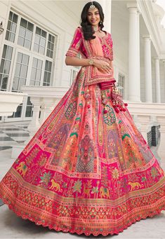 Woven Jacquard silk lehenga choli in Pink and Peach color 1027 Desc:  Style : A-Line Lehenga Choli Color : Peach and Pink Fabric : Silk , Net dupatta Work : Heavy Jacquard Woven With Embroidery & Stone Work Wash Care : Dry clean Sleeve Style : Half Sleeve Long Sleeves : Done only in Custom Stitch Sleeves Lining : Done only in Custom Stitch Bust Size : 32 to 42 Inches Occasion : Wedding   Mehendi   Sangeet   Engagement   Reception   Ceremonial   Baby Shower. With Express Free Shipping and Cus Long Choli Lehenga, Lehenga Pink, Peach Lehenga, Silk Lehenga Choli, Latest Bridal Lehenga, Lehenga Designs Simple, Lehenga Online, Lehenga Choli Online, Bridal Lehenga Choli