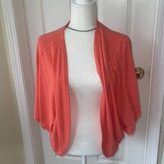 This Melon Orange Lightweight Sweater Is Very Drapy And Forgiving. Would Look Great With A Contrasting Color Like Blue. Bought It And Never Wore It Is A Os, But It Would Fit A 10-14 Easily. See Pics For Measurements Smoke Free Home Casual Fitted Open Front Tops, Casual Open Front Top In Solid Color, Casual Stretch Short Sleeve Cardigan, Casual Open Front Knit Top, One Size Knit Open Front Tops, One Size Open Front Knit Top, Casual Open Front One Size Tops, Casual One Size Open Front Tops, Orange Sweater