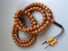 Bodhi seed mala 108 bead Mala Necklace Adjustable Artisan Mala For Rituals, Adjustable Traditional Beaded Bracelet With Wooden Beads, Traditional Adjustable Beaded Bracelets With Wooden Beads, Traditional Adjustable Wooden Beaded Bracelets, Adjustable Traditional Wooden Beaded Bracelets, Artisan Adjustable Beaded Necklace For Meditation, Artisan Adjustable Mala With 108 Beads, Adjustable Spiritual Beaded Necklaces For Rituals, Adjustable Round Brown Beaded Necklace