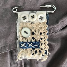 a piece of cloth with buttons attached to it