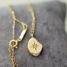 Collection : '' I see lots of stars but none of them is you'' Chain lentgh : 16 in Pendant width : 11mm (0.43 in)  , height : 14mm (0,55 in) Weight for 14K Gold : 3.16gr (approximate) 14K Gold *Fedex Express Shipping 2-7 business days to Worldwide ✦ Registered mail which require a signature ✦ We need your phone number for Fedex/TNT receipts. ✦ We can't send to PO BOX adresses. All of our products are our own designs and are produced in our workshop. These products, which are pure gold, are handcrafted with the purity specified. When you order, you receive beautiful and high-quality jewelery crafted with exquisite craftsmanship and pure gold. Orders are prepared in 2-3 business days and delivered to America, Australia and Europe in 2-5 business days with free shipping. All products reach yo Engraved Star-shaped Yellow Gold Necklace, Yellow Gold Star Charm Necklace For Anniversary, Silver 14k Gold Necklace With Star Charm, Anniversary Necklace With Star Charm, 14k Gold Necklace With Star Charm And Round Pendant, Engraved Star Yellow Gold Necklace, 14k Yellow Gold Necklaces With Star Charm, 14k Gold Star Of David Necklace Engraved, 14k Yellow Gold Necklace With Star Charm