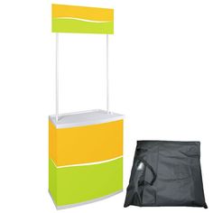 an ice cream stand with a black bag next to it and a white background behind it