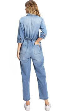 Aviator-inspired coverall with a collared neckline, button down closure down the front. Complete with chest pockets, as well on the front and back. 3/4 length sleeves with a button closure on the ends. Relaxed silhouette with an elastic waistband and straight-leg ankle length bottoms. Runs big! CARE | Machine Wash Cold CONTENTS | 65% Cotton, 33.7% Polyester, 1.3% Spandex MEASUREMENTS | 56"/142 cm Top to Bottom 26"/65 cm Inseam (Size Small) MODEL | 5'8 - wearing a size Small IMPORTED Denim Coverall, Coverall Jumpsuit, Aviators Women, Boiler Suit, Straight Leg Denim, Light Denim, Tube Top, Ankle Length, Suits For Women