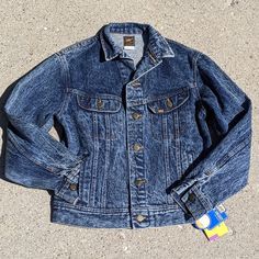 Amazing Deadstock (New With Tags) Rider Jacket By Lee In A Tagged Size 18. Basic Approx Measurements Are Pictured. Comparable To A Modern Large. Please Refer To Measurements For Best Fit. Blue Glacier Wash Full Button Front Button Wrists Lower Hand Warmer Pockets Upper Chest Button Pockets 100% Cotton Made In Usa Heavyweight Denim Trucker, 1980s, Unisex Denim Parka, Lee Denim Jacket, Rider Jacket, Denim Jacket Short, 1970s Women, Usa Jeans, Fitted Denim Jacket, Denim Shirt With Jeans, Riders Jacket