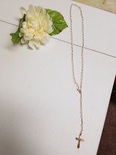 "Beautiful Vintage Rosary, new never been used in original clear box. Makes a perfect gift for Catholic Wedding couple, First Communion, Confirmation, Birthday. Dementions: Decades length: 22\" Complete folded rosary as shown laying on table including crucifix: 16 1/4\" Crucifix: 1 1/4\" x 5/8\" FINAL SALE, NO RETURNS, NO EXCHANGES, PLEASE CONTACT FOR ANY QUESTIONS OR CONCERNS AFTER LOOKING AT ALL THE PICTURES." Elegant Gold Rosary For Gift, Elegant Gold Rosary As Gift, Gold Rosary With Round Beads As Gift, Gold Round Beads Rosary As Gift, Gold Rosary Bracelet For Baptism, Gold Rosary With Beaded Chain, Gold Spiritual Rosary For First Communion, Gold Rosary With Beaded Chain As Gift, Gold Spiritual Rosary Bracelet For Baptism