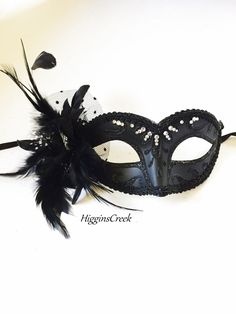 Black Womens masquerade mask with polka dot tulle, black feather mask with diamond crystals Black Masquerade Mask For Halloween Wedding, Black Venetian Masquerade Mask For Carnival, Black Masquerade Mask For Wedding Carnival, Elegant Black Mask For Costume Party, Elegant Black Masquerade Mask For Halloween, Elegant Black Masks For Carnival, Elegant Black Eye Mask, Black Feathered Masquerade Mask For Costume Party, Black Masquerade Mask For Carnival Evening