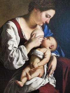 a painting of a woman holding a baby